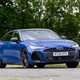 Audi A6 saloon (2025) review: front three quarter cornering, blue paint, low angle