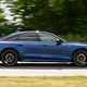 Audi A6 saloon (2025) review: side view driving, blue paint