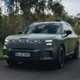 Smart #5 (2025) review: front three quarter driving, matte grey paint, Brabus trim