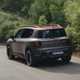 Smart #5 (2025) review: rear three quarter driving, matte grey paint, Brabus trim