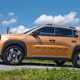 Fiat Grande Panda Hybrid (2025) review: side view driving, bronze paint