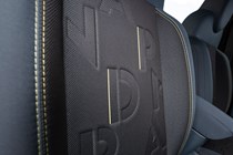 Fiat Grande Panda Hybrid (2025) review: front seats, blue and black upholstery, close up