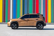 Fiat Grande Panda Hybrid (2025) review: side view static, bronze paint