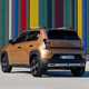 Fiat Grande Panda Hybrid (2025) review: rear three quarter static, bronze paint