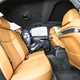 Image of the Audi S8's rear seats, viewed from the open right-hand door, with a child seat on the left-hand side