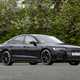 Image of a static, black Audi S8, looking at its front right corner