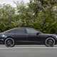 Image of a static, black Audi S8, looking at its right side
