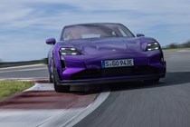 Porsche Taycan review - Turbo GT Weissach package, Purple Sky metallic, front view, driving round corner on track