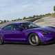 Porsche Taycan review - Turbo GT Weissach package, Purple Sky metallic, front side view, driving on track