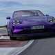 Porsche Taycan review - Turbo GT Weissach package, Purple Sky metallic, front view, driving round corner on track