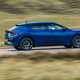 Kia EV6 GT review - facelift, rear side, blue, driving