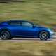 Kia EV6 GT review - facelift, side, blue, driving