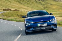 Kia EV6 GT review - facelift, front, blue, driving round corner
