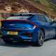 Kia EV6 GT review - facelift, rear, blue, driving
