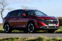 The Nissan Qashqai is our Lease of the Week, red, cornering
