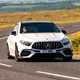 Mercedes-AMG A45 S review - facelift, front, white, driving round corner