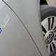2020 silver Volkswagen e-Up door badge detail