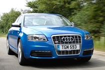 The Audi S6 V10, blue, front three-quarters, driving