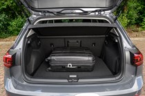 Volkswagen Golf (2024) review: boot space with a case in it, black upholstery