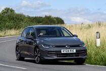 Volkswagen Golf (2024) review: front three quarter driving, grey paint