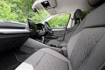 Volkswagen Golf (2024) review: front seats, black and grey fabric upholstery