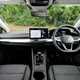Volkswagen Golf (2024) review: dashboard and infotainment system, black and grey fabric upholstery