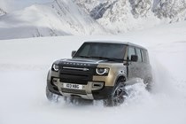 Land Rover Defender 110 (2020-) driving action in the snow