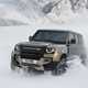 Land Rover Defender 110 (2020-) driving action in the snow