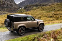 Gold 2021 Land Rover Defender 90 rear three-quarter