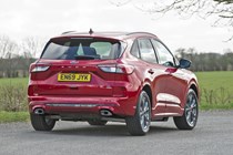 Lucid Red 2020 Ford Kuga rear three-quarter driving