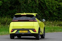 BYD Dolphin Surf (2025) review: rear three quarter cornering, yellow paint, low angle