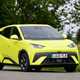 BYD Dolphin Surf (2025) review: front three quarter cornering, yellow paint