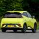 BYD Dolphin Surf (2025) review: rear three quarter cornering, yellow paint