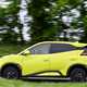 BYD Dolphin Surf (2025) review: side view driving, yellow paint