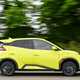 BYD Dolphin Surf (2025) review: side view driving, yellow paint