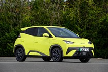 BYD Dolphin Surf (2025) review: front three quarter static, yellow paint