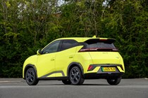 BYD Dolphin Surf (2025) review: rear three quarter static, yellow paint