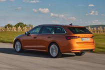 Skoda Octavia Estate review, Mk4 facelift, orange, rear, driving