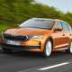 Skoda Octavia Estate review, Mk4 facelift, orange, front, driving