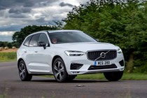 Volvo XC60 B4, front view, driving front corner, white