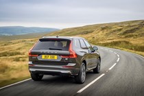 Volvo XC60 T6 Recharge, rear view, driving, grey