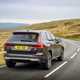 Volvo XC60 T6 Recharge, rear view, driving, grey