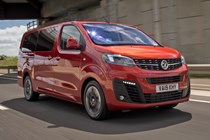 Orange 2019 Vauxhall Vivaro Life driving front three-quarter