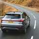 Audi SQ5 review - rear, grey, driving round corner