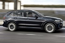 BMW iX3 (2021) profile view, driving