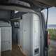 Image of the Ford Transit Custom Nugget interior, looking towards the front through the open tailgate
