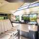 Image of the Mercedes Marco Polo interior, looking at the dining area from the open rear side door