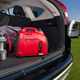 Image of a Honda power station in the boot a Volvo XC90