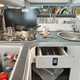 Image of a Ford Nugget kitchen with kitchenware out