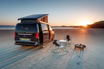 Image of a Mercedes Marco Polo pitched on a beach at sunset